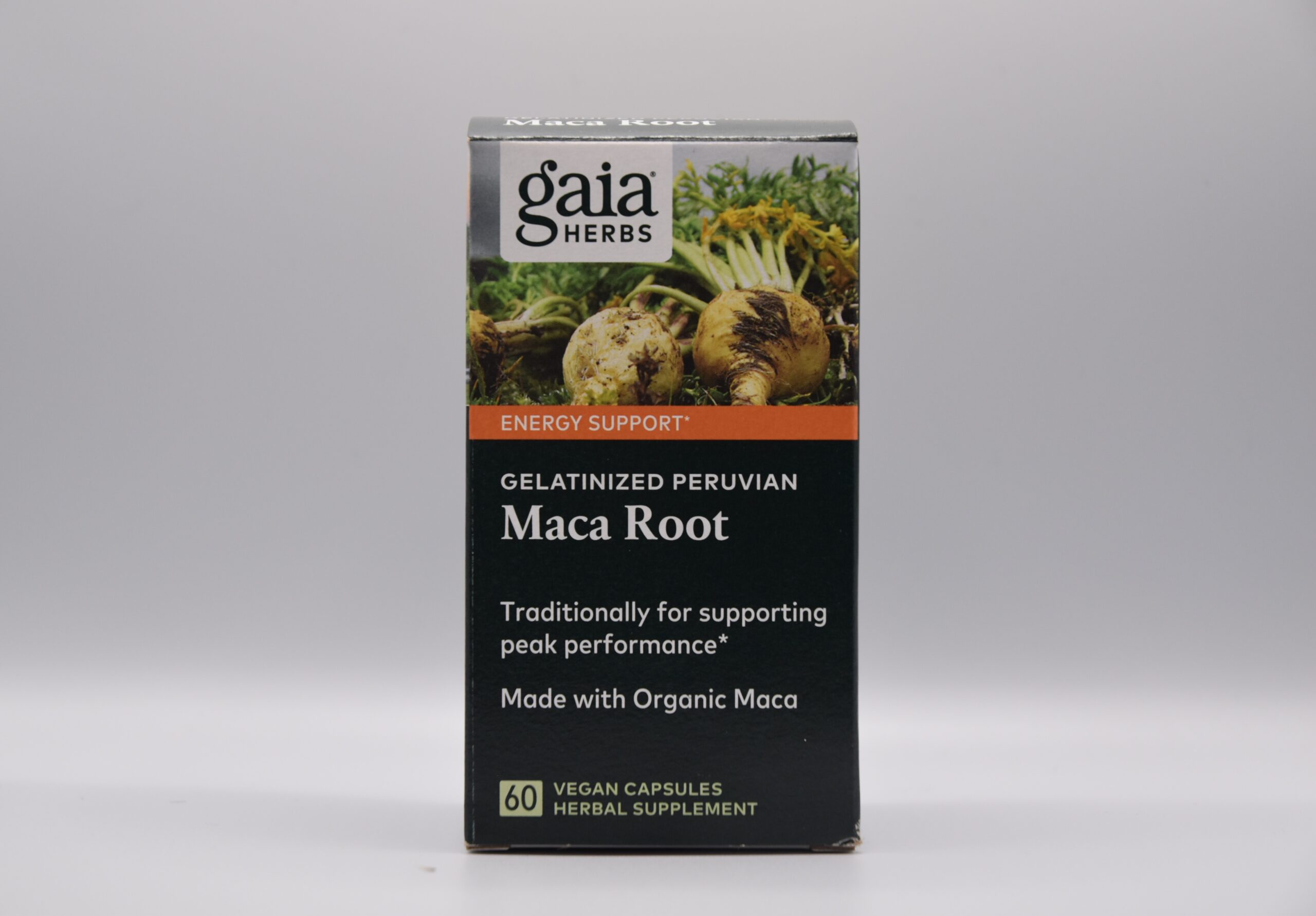 A box of Maca Root - 60 Vegetarian Capsules with a label stating "energy support," and "traditionally for supporting peak performance," containing 60 vegan capsules and made with organic maca.