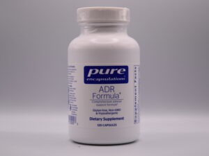 A bottle of Pure ADR Formula - 120 Caps dietary supplement against a neutral background, containing 120 capsules designed for adrenal support.