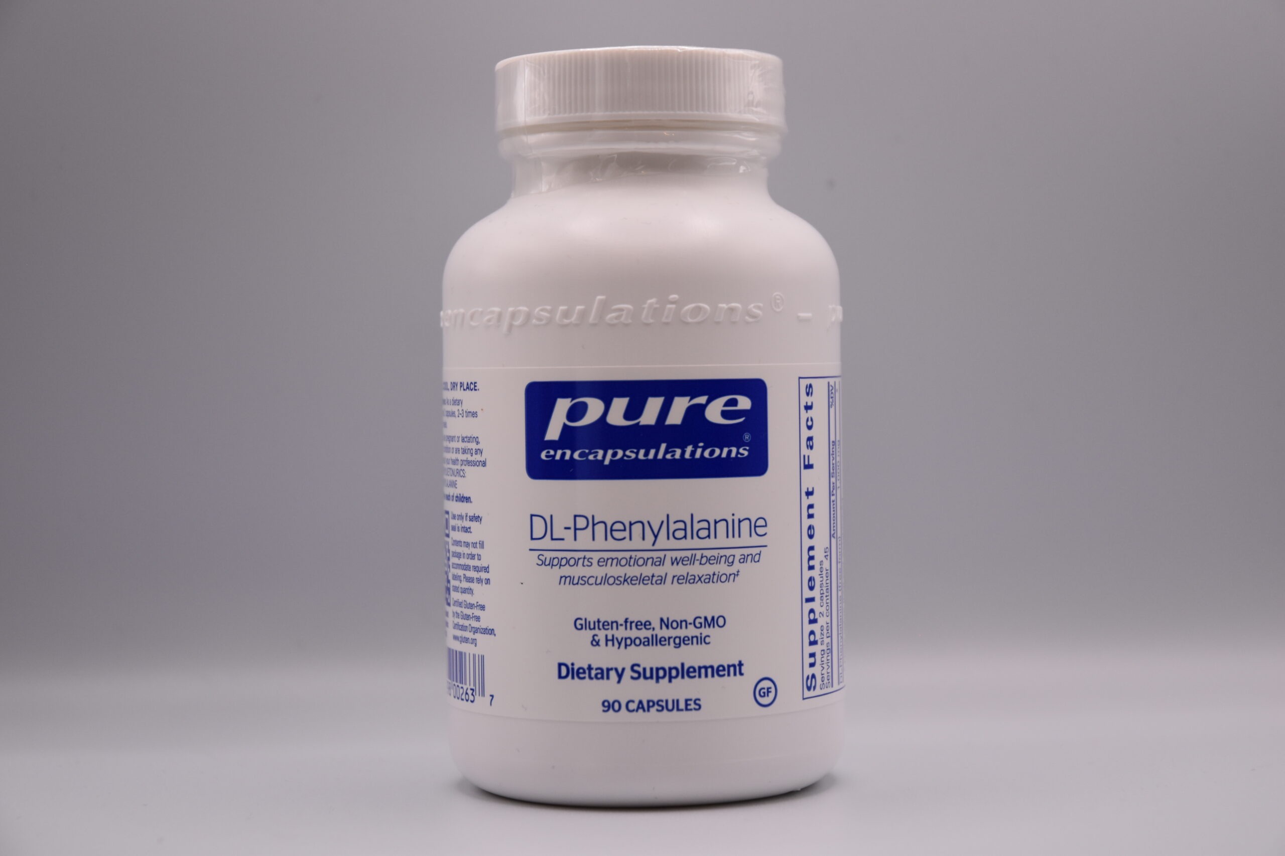 Bottle of DL-Phenylalanine dietary supplement by Pure Encapsulations, stating support for emotional well-being and muscles, with 90 capsules, gluten-free, and non-GMO.