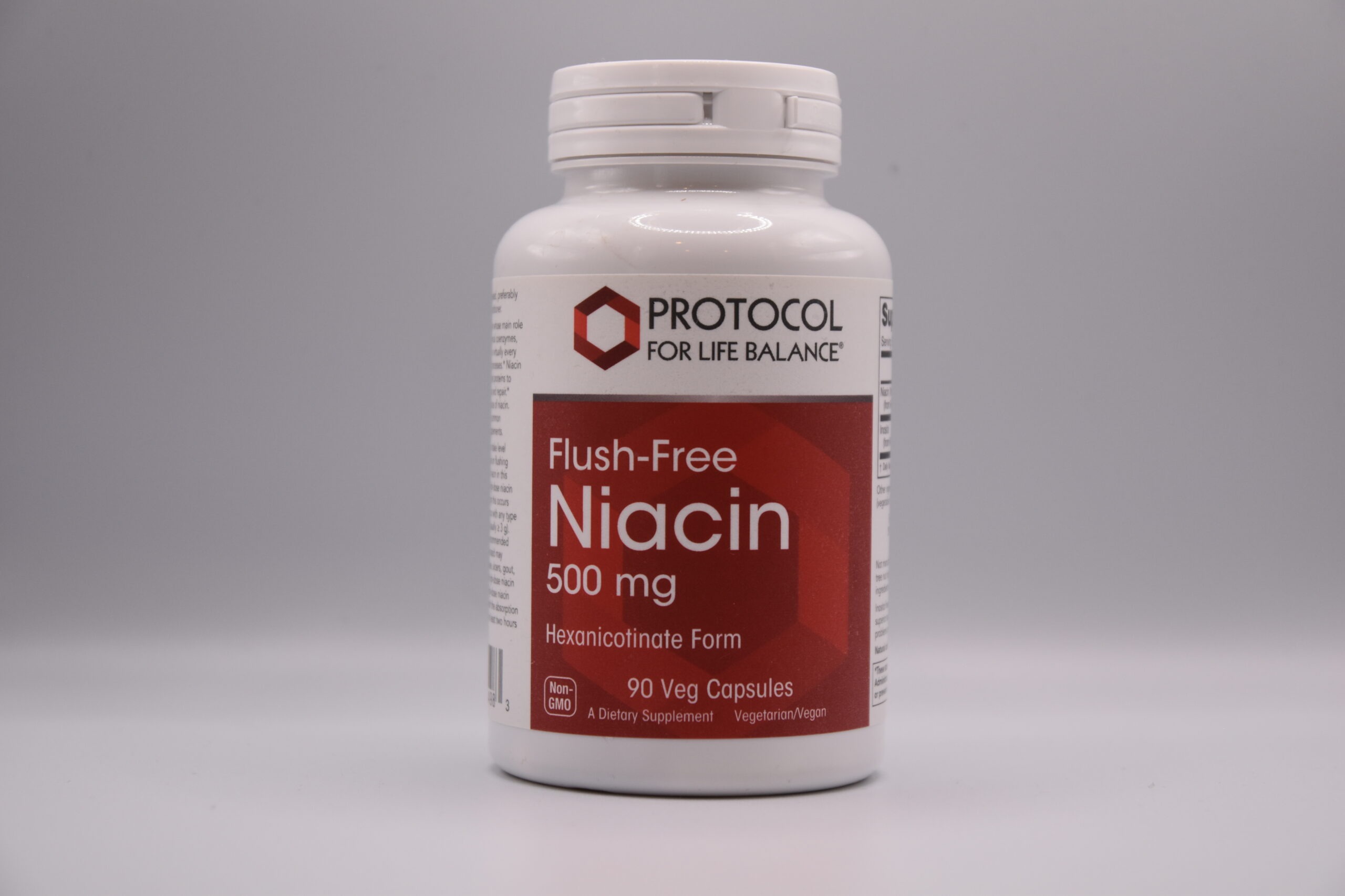 Sentence with product name: A bottle of Flush-Free Niacin brand flush-free niacin, 500 mg hexanicotinate form, containing 90 veg capsules as a dietary supplement.