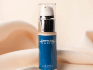O3 Morning Boost bottle displayed on peachy silk fabric, capturing an energizing yet gentle start to the day.