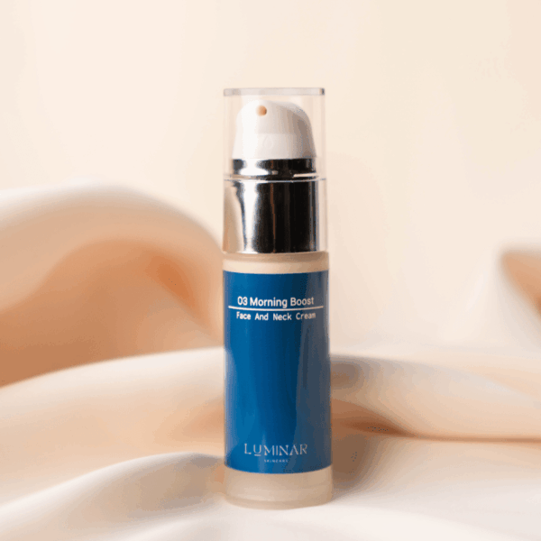 O3 Morning Boost bottle displayed on peachy silk fabric, capturing an energizing yet gentle start to the day.